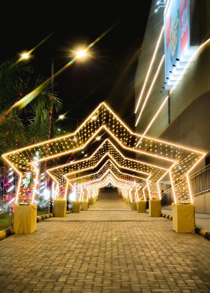Dazzling star-shaped light tunnel in Thiruvananthapuram, India. Perfect for festive season.